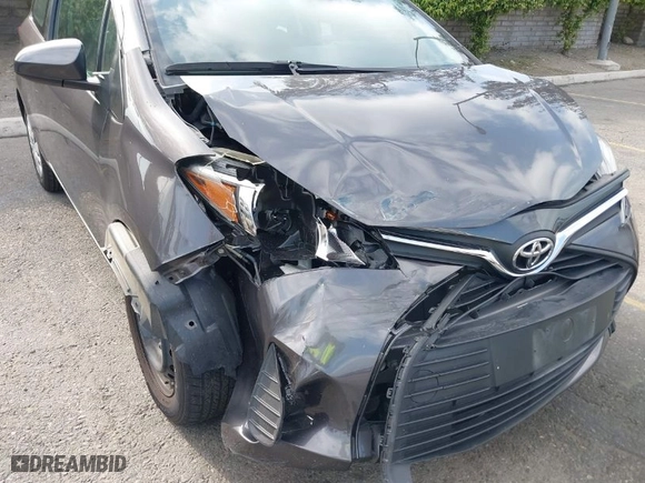 2015 Toyota Yaris L with VIN VNKJTUD3XFA019088, listed as a IAAI auction lot 41892895 with 19,360 mi miles. Bid and sale history available at carsss.com. Image 6.