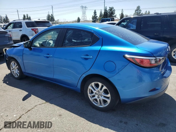 2016 Scion iA z VIN 3MYDLBZV6GY141028, wystawiony jako Copart lot #55264655 z przebiegiem 110 327 mil mil oraz Czysty tytuł • Clean title. Historia ofert i sprzedaży dostępna na DreamBid. Obrazek 2.
