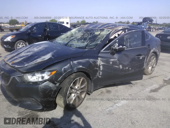 2016 Mazda Mazda6 i Touring with VIN JM1GJ1V51G1469446, listed as a IAAI auction lot 24549066 with 40,606 mi miles. Bid and sale history available at carsss.com. Image 2.