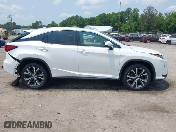 2019 Lexus RX 350 with VIN 2T2BZMCA7KC182763, listed as a IAAI auction lot 42418779 with 82,254 mi miles and . Bid and sale history available at DreamBid. Image 13.