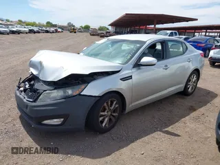 2012 Kia Optima LX with VIN 5XXGM4A7XCG063387, listed as a IAAI auction lot 42087129 with 180,585 mi miles and . Bid and sale history available at carsss.com. Image 2.