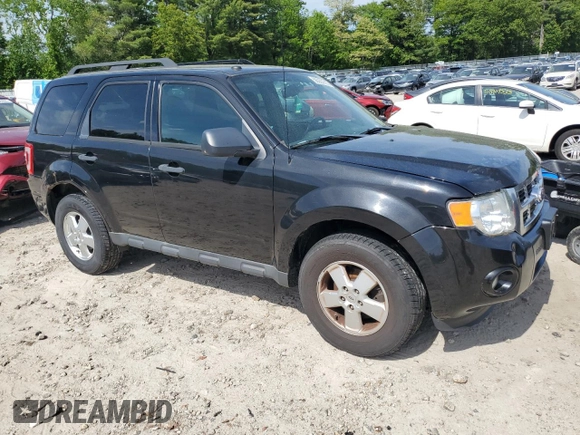 2011 Ford Escape XLT with VIN 1FMCU9DGXBKA90337, listed as a Copart auction lot 56063355 with 122,956 mi miles and Non repairable. Bid and sale history available at DreamBid. Image 4.