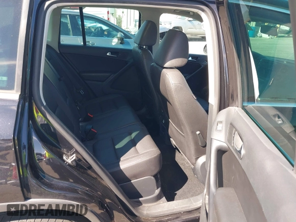2015 Volkswagen Tiguan SE with VIN WVGAV7AX5FW509612, listed as a IAAI auction lot 42020599 with 64,201 mi miles and . Bid and sale history available at DreamBid. Image 8.