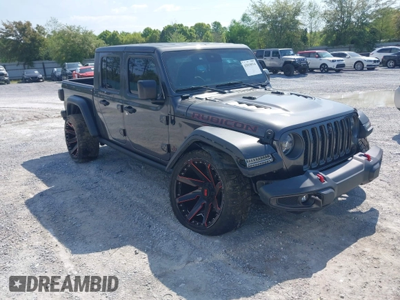2020 Jeep Gladiator Rubicon with VIN 1C6JJTBG0LL187537, listed as a IAAI auction lot 42018914 with 53,443 mi miles and . Bid and sale history available at DreamBid. Image 1.