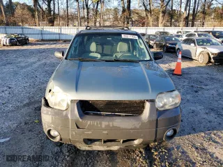 2007 Ford Escape XLT with VIN 1FMYU03167KB88321, listed as a Copart auction lot 86617164 with 261,561 mi miles and Salvage Title. Bid and sale history available at carsss.com. Image 5.