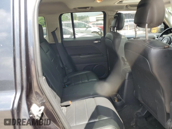 2015 Jeep Patriot High Altitude with VIN 1C4NJPFA4FD192777, listed as a Copart auction lot 54716275 with 104,368 mi miles and Salvage title. Bid and sale history available at DreamBid. Image 11.