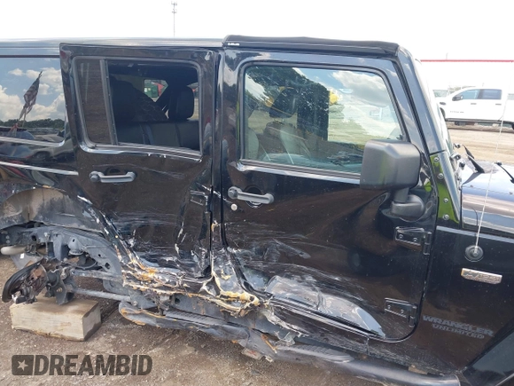 2017 Jeep Wrangler Unlimited Sahara with VIN 1C4BJWEGXHL520182, listed as a IAAI auction lot 42616692 with 88,169 mi miles and . Bid and sale history available at DreamBid. Image 14.