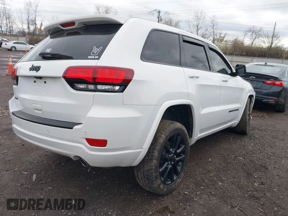 2018 Jeep Grand Cherokee Altitude with VIN 1C4RJFAG2JC284301, listed as a IAAI auction lot 41832657 with 97,160 mi miles and . Bid and sale history available at DreamBid. Image 4.