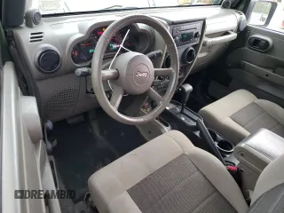 2008 Jeep Wrangler X with VIN 1J4FA24188L638183, listed as a Copart auction lot 56112955 with 112,438 mi miles and Salvage title. Bid and sale history available at DreamBid. Image 8.
