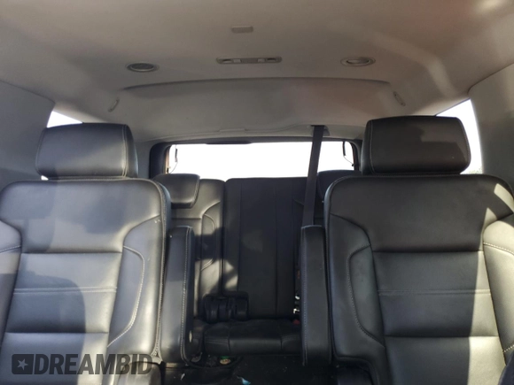 2015 GMC Yukon Denali with VIN 1GKS2CKJ8FR596848, listed as a Copart auction lot 52048105 with 129,935 mi miles and Salvage Title. Bid and sale history available at carsss.com. Image 10.
