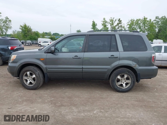 2007 Honda Pilot EX-L z VIN 2HKYF18587H511816, wystawiony jako IAAI lot #42366623 z przebiegiem 170 866 mil mil oraz . Historia ofert i sprzedaży dostępna na DreamBid. Obrazek 14.
