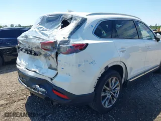 2016 Mazda CX-9 Grand Touring with VIN JM3TCBDY7G0125708, listed as a IAAI auction lot 39891843 with 133,988 mi miles. Bid and sale history available at carsss.com. Image 18.