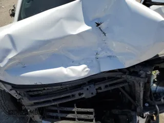 2018 Chevrolet Tahoe LS with VIN 1GNSCAKC0JR296669, listed as a Copart auction lot 54044745 with 147,457 mi miles and Salvage title. Bid and sale history available at DreamBid. Image 12.