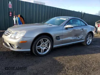 2007 Mercedes-Benz SL with VIN WDBSK77F57F123790, listed as a Copart auction lot 84296694 with 51,364 mi miles and Salvage title. Bid and sale history available at DreamBid. Image 1.