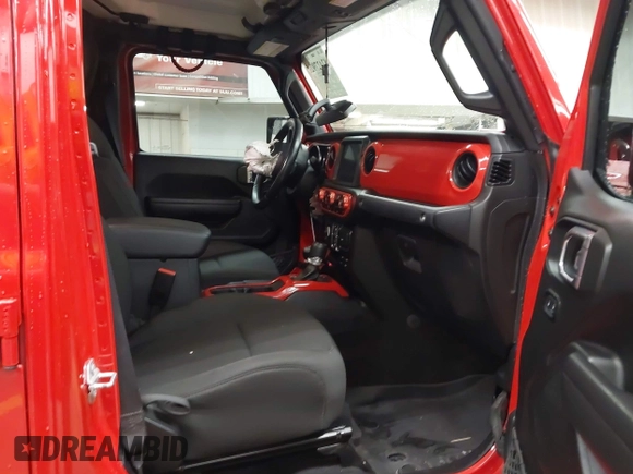 2022 Jeep Gladiator Altitude z VIN 1C6HJTAGXNL117353, wystawiony jako IAAI lot #42427921 z przebiegiem 28 801 mil mil oraz . Historia ofert i sprzedaży dostępna na DreamBid. Obrazek 5.