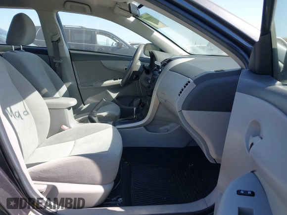2009 Toyota Corolla with VIN 1NXBU40E99Z108425, listed as a IAAI auction lot 39553892 with 208,165 mi miles and . Bid and sale history available at DreamBid. Image 5.