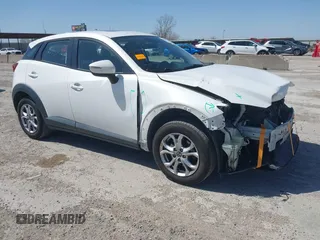 2016 Mazda CX-3 Touring with VIN JM1DKBC71G0126040, listed as a IAAI auction lot 41860285 with 97,986 mi miles and . Bid and sale history available at DreamBid. Image 1.