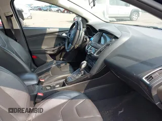 2016 Ford Focus Titanium with VIN 1FADP3N26GL206866, listed as a IAAI auction lot 42403015 with 95,753 mi miles and . Bid and sale history available at DreamBid. Image 5.