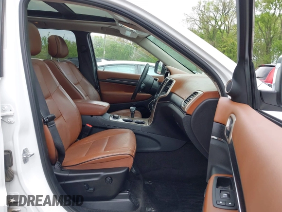 2015 Jeep Grand Cherokee Summit with VIN 1C4RJFJG5FC104087, listed as a IAAI auction lot 42100298 with 88,710 mi miles and . Bid and sale history available at DreamBid. Image 5.