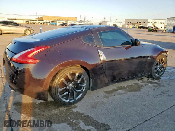 2015 Nissan 370Z with VIN JN1AZ4EH1FM442502, listed as a Copart auction lot 48332035 with 101,462 mi miles and Salvage Title. Bid and sale history available at carsss.com. Image 3.