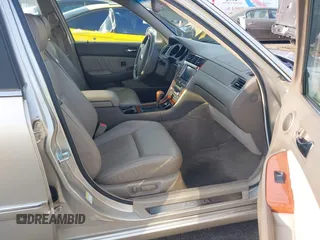 2004 Acura RL w/Navigation System z VIN JH4KA96664C001291, wystawiony jako IAAI lot #41678449 z przebiegiem 83 954 mil mil oraz . Historia ofert i sprzedaży dostępna na DreamBid. Obrazek 5.