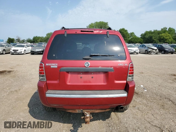 2006 Mercury Mariner Luxury with VIN 4M2YU57146KJ07465, listed as a Copart auction lot 62532264 with 126,009 mi miles and Salvage title. Bid and sale history available at DreamBid. Image 6.