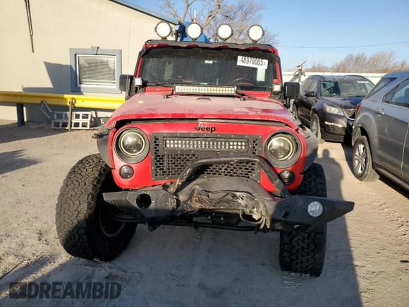 2016 Jeep Wrangler Unlimited Sport with VIN 1C4BJWDG2GL235220, listed as a Copart auction lot 48978005 with 126,863 mi miles and Salvage Title. Bid and sale history available at DreamBid. Image 5.