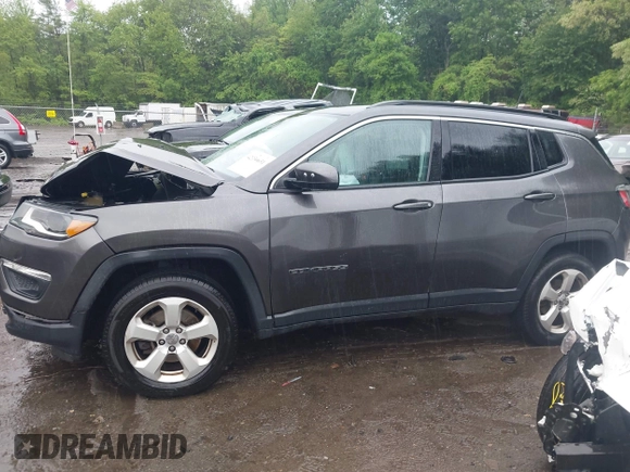 2018 Jeep Compass Latitude with VIN 3C4NJDBB5JT337129, listed as a IAAI auction lot 42330631 with 126,827 mi miles and . Bid and sale history available at DreamBid. Image 13.