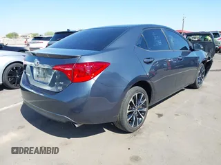 2019 Toyota Corolla L with VIN 2T1BURHE3KC207010, listed as a IAAI auction lot 42004596 with 106,188 mi miles and . Bid and sale history available at DreamBid. Image 4.