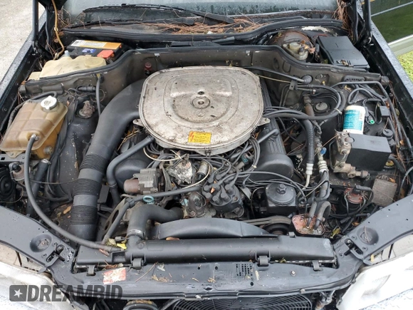 1985 Mercedes-Benz 500 SEL z VIN WDBCA37D2FA121537, wystawiony jako Copart lot #74276044 z przebiegiem Nie podano mil oraz Szkoda całkowita • Salvage title. Historia ofert i sprzedaży dostępna na DreamBid. Obrazek 11.