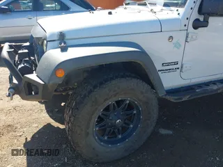 2017 Jeep Wrangler Unlimited Sport with VIN 1C4BJWDG4HL502861, listed as a IAAI auction lot 40895010 with 62,970 mi miles. Bid and sale history available at carsss.com. Image 6.