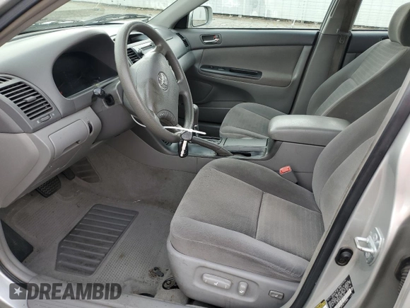 2005 Toyota Camry LE with VIN 4T1BF32KX5U601192, listed as a Copart auction lot 55365485 with 153,251 mi miles and Salvage Title. Bid and sale history available at DreamBid. Image 7.