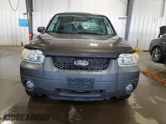 2005 Ford Escape XLT with VIN 1FMYU93135KD88798, listed as a Copart auction lot 69311714 with 81,126 mi miles and Salvage Title. Bid and sale history available at carsss.com. Image 5.