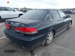 2002 Honda Accord SE z VIN 1HGCG66812A084949, wystawiony jako IAAI lot #42081536 z przebiegiem 309 920 mil mil oraz . Historia ofert i sprzedaży dostępna na DreamBid. Obrazek 4.
