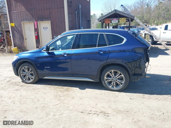 2017 BMW X1 xDrive28i with VIN WBXHT3C33H5F82035, listed as a IAAI auction lot 41944399 with 102,942 mi miles. Bid and sale history available at carsss.com. Image 14.