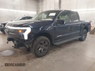 2023 Ford F-150 Lightning Pro with VIN 1FTVW1EL4PWG22900, listed as a IAAI auction lot 42139391 with 6,569 mi miles and . Bid and sale history available at DreamBid. Image 20.