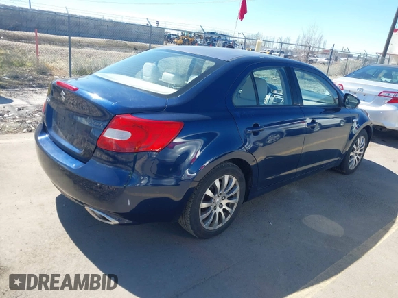 2010 Suzuki Kizashi SE with VIN JS2RE9A31A6100988, listed as a IAAI auction lot 41826305 with 173,168 mi miles and . Bid and sale history available at DreamBid. Image 4.