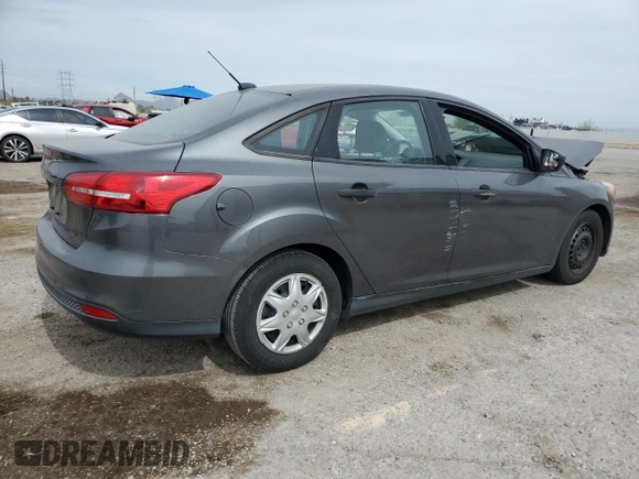 2017 Ford Focus S z VIN 1FADP3E21HL304026, wystawiony jako Copart lot #58786875 z przebiegiem 68 092 mil mil oraz Szkoda całkowita • Salvage title. Historia ofert i sprzedaży dostępna na DreamBid. Obrazek 3.