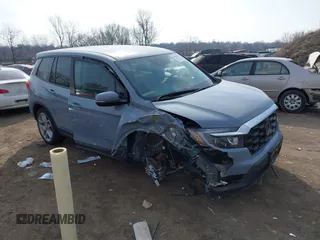 2024 Honda Passport EX-L z VIN 5FNYF8H54RB015972, wystawiony jako IAAI lot #41904138 z przebiegiem 9 638 mil mil oraz . Historia ofert i sprzedaży dostępna na DreamBid. Obrazek 1.