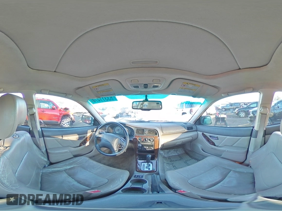 2002 Subaru Legacy Outback Limited with VIN 4S3BH686527652037, listed as a Copart auction lot 83311474 with 212,548 mi miles and Salvage title. Bid and sale history available at DreamBid. Image 12.