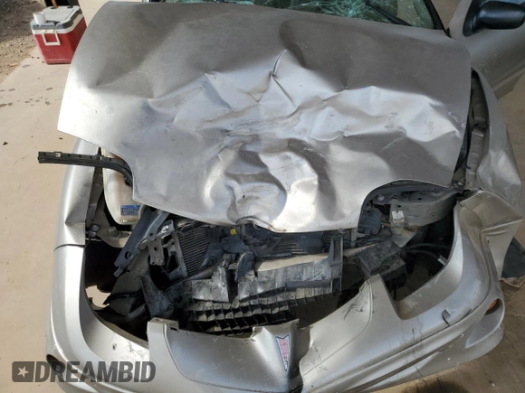 2002 Pontiac Sunfire SE z VIN 1G2JB524027308408, wystawiony jako Copart lot #61752784 z przebiegiem Nie podano mil oraz Szkoda całkowita • Salvage title. Historia ofert i sprzedaży dostępna na DreamBid. Obrazek 12.
