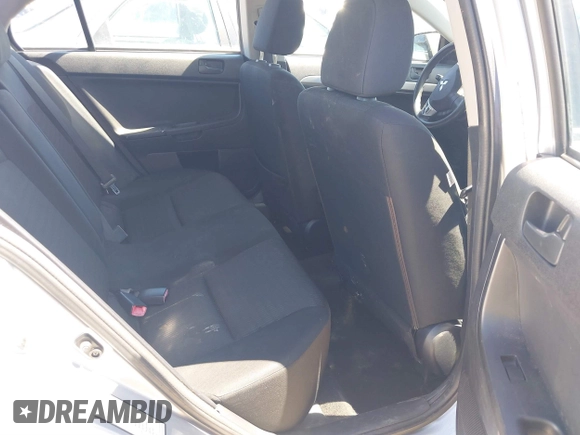 2013 Mitsubishi Lancer ES with VIN JA32U2FUXDU018599, listed as a IAAI auction lot 41858172 with 138,351 mi miles and . Bid and sale history available at DreamBid. Image 8.
