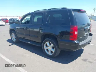 2007 Chevrolet Tahoe LT with VIN 1GNFK13057J112892, listed as a IAAI auction lot 42723713 with 232,044 mi miles and . Bid and sale history available at DreamBid. Image 3.