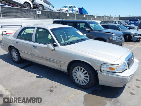 2008 Mercury Grand Marquis LS z VIN 2MEFM75V08X662376, wystawiony jako IAAI lot #42414652 z przebiegiem 86 537 mil mil oraz . Historia ofert i sprzedaży dostępna na DreamBid. Obrazek 1.