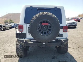 2015 Jeep Wrangler Unlimited Rubicon с VIN 1C4BJWFG3FL771508, выставлен на аукционе Copart как лот 62006295 с пробегом 108 128 миль миль и Списание • Salvage title. История ставок и продаж доступна на DreamBid. Изображение 6.