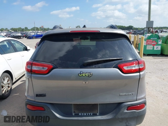 2016 Jeep Cherokee Sport z VIN 1C4PJLAB3GW230328, wystawiony jako IAAI lot #42567276 z przebiegiem 99 125 mil mil oraz . Historia ofert i sprzedaży dostępna na DreamBid. Obrazek 16.