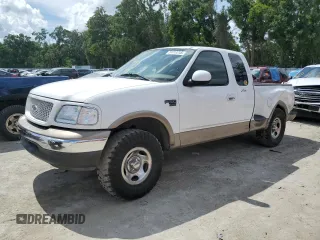 2003 Ford F-150 XL with VIN 1FTRX07W13KC28871, listed as a Copart auction lot 59003245 with 180,197 mi miles and Salvage title. Bid and sale history available at DreamBid. Image 1.