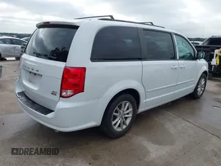 2015 Dodge Grand Caravan SXT with VIN 2C4RDGCG2FR548433, listed as a IAAI auction lot 42121256 with 161,459 mi miles and . Bid and sale history available at DreamBid. Image 4.