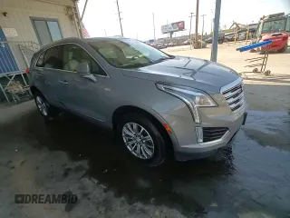 2019 Cadillac XT5 Luxury FWD z VIN 1GYKNCRS4KZ221304, wystawiony jako Copart lot #54995415 z przebiegiem 128 940 mil mil oraz Szkoda całkowita • Salvage title. Historia ofert i sprzedaży dostępna na DreamBid. Obrazek 14.