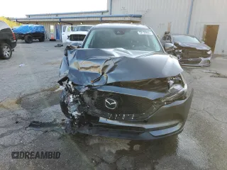 2019 Mazda CX-5 Grand Touring with VIN JM3KFBDM9K0676795, listed as a Copart auction lot 52129885 with 71,869 mi miles and Salvage Title. Bid and sale history available at carsss.com. Image 5.